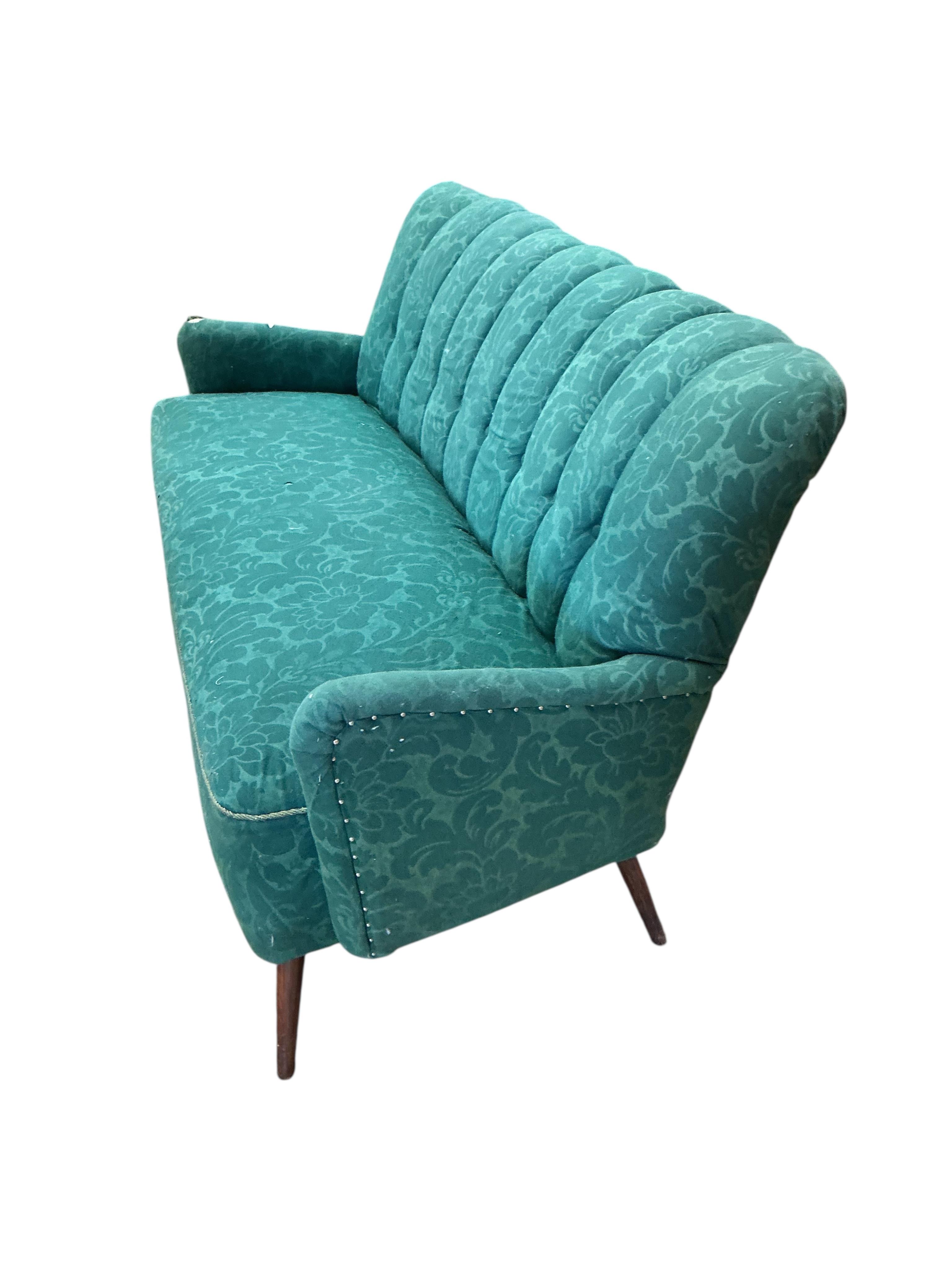 A mid century upholstered settee, width 150cm, depth 70cm, height 80cm